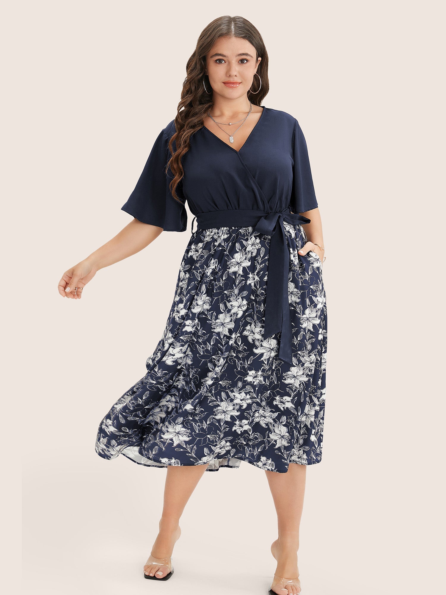 Floral Patchwork Pocket Belt Surplice Neck Ruffle Hem Dress