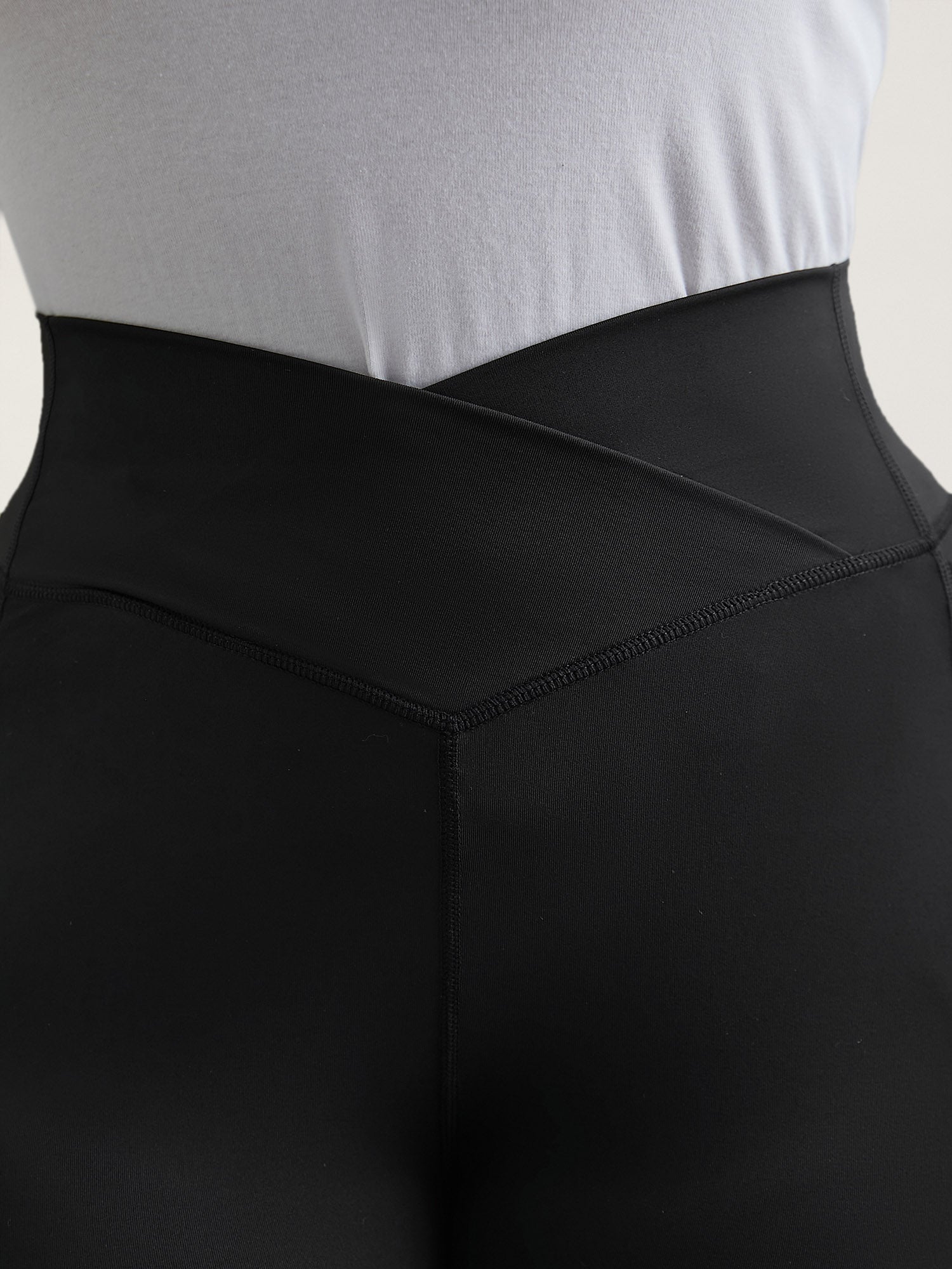 Criss-Cross Waist Pocket Tight Pants