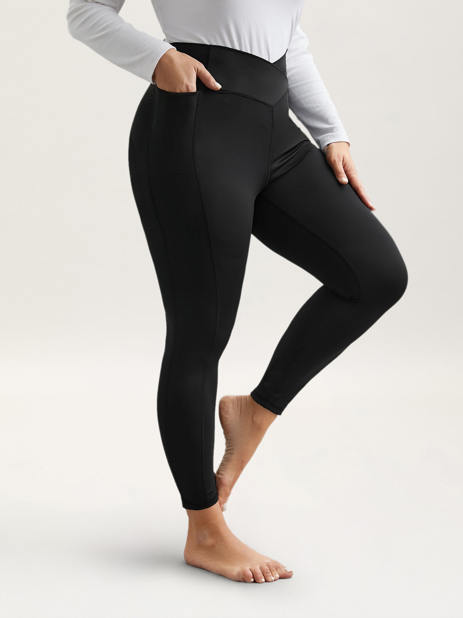 Criss-Cross Waist Pocket Tight Pants