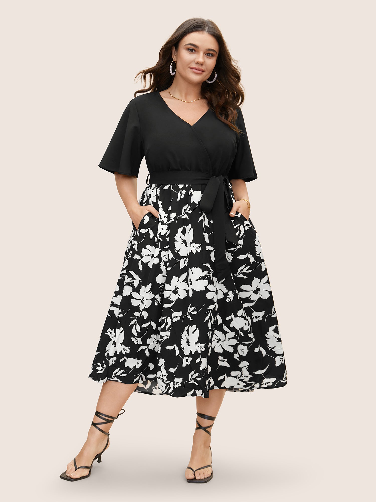 Floral Patchwork Pocket Belt Surplice Neck Ruffle Hem Dress